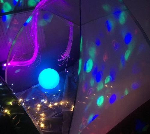 white den projector tent sensory activity